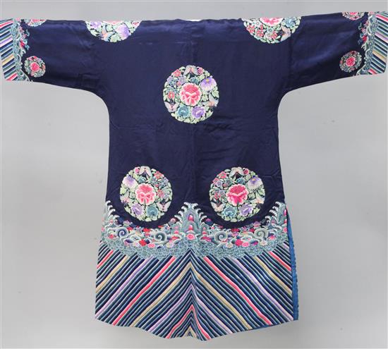 A Chinese dark blue satin and embroidered ladys robe, Qing dynasty,